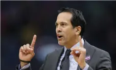  ?? AP PHOTO/RUSTY COSTANZA ?? Miami Heat coach Erik Spoelstra questions a referee during the first half of the team’s NBA basketball game against the New Orleans Pelicans in New Orleans, on March 6.