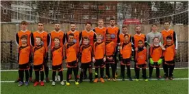  ??  ?? Sumas line-up with their U10s mascots