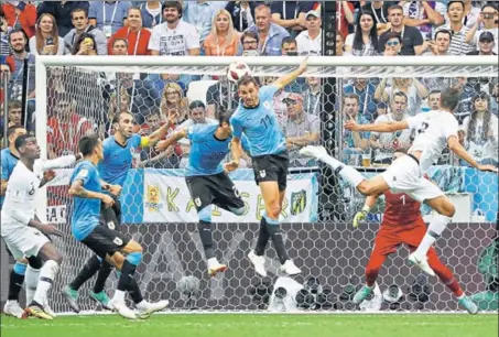  ?? REUTERS ?? France's Raphael Varane scores against Uruguay in Nizhny on Friday.