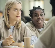  ??  ?? Taylor Schilling, left, and Uzo Aduba in a scene from Orange Is the New