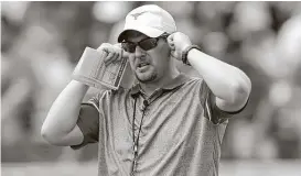  ?? Tim Warner / Getty Images ?? New Texas coach Tom Herman has come a long way since his days as a graduate assistant at UT. He arrives equipped to prepare his team for the unexpected.