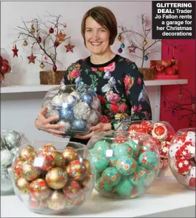  ??  ?? GLITTERING DEAL: Trader Jo Fallon rents
a garage for her Christmas
decoration­s