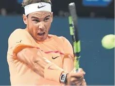  ??  ?? Rafael Nadal of Spain hits a return against Alexandr Dolgopolov of Ukraine in the men’s round one at the Brisbane Internatio­nal tennis tournament in Brisbane. — AFP photo