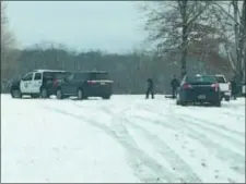  ??  ?? Hamilton Twp. Police and Mercer County officers investigat­e a dead body found in Mercer County Park near Hughes Drive entrance.