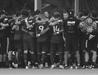  ?? STEPHEN M. DOWELL/ORLANDO SENTINEL ?? Orlando City players huddle before facing New York City FC last week at ESPN Wide World of Sports.