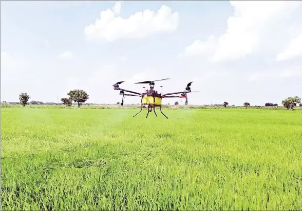  ?? SUPPLIED ?? The 15kg drone can carry 20 litres of liquid. It is equipped with GPS and five different types of electrosta­tic sprayers suitable for different crops.