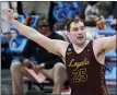  ?? PAUL SANCYA — THE ASSOCIATED PRESS ?? Loyola Chicago center Cameron Krutwig (25) reacts to a basket against Illinois during the second half of a game in the second round of the NCAA tournament at Bankers Life Fieldhouse in Indianapol­is.