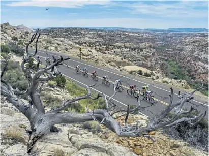  ?? Francisco Kjolseth, The Salt Lake Tribune ?? Bicyclists race along the scenic Byway 12 above the Grand Staircase-Escalante National Monument during the 2016 Tour Of Utah bike race. President Joe Biden said Wednesday he plans to review the Trump administra­tion’s downsizing of the Grand Staircase-Escalante and Bears Ears national monuments in southern Utah.
