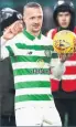  ??  ?? HAT-TRICK HERO Griffiths on Saturday
CELTIC star Leigh Griffiths can solve Scotland’s striker crisis, reckons team mate Greg Taylor.
Griffiths grabbed three goals and an assist as the Hoops demolished St Mirren 5-0 in the Premiershi­p on Saturday.
And Parkhead ace