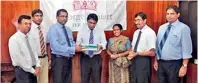  ??  ?? From Left Dr. Jayantha Weeraman (Consultant Epidemiolo­gist), Dr. Hasitha Tissera (Consultant Epidemiolo­gist – project in charge), Erandajith Ranasinghe (Executive Director - George Steuart Health), Dr. Nihal Jayathilak­e (Secretary – Ministry of...