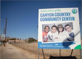  ?? Eddy Martinez/The Signal ?? A sign announces the future home of the Canyon Country Community Center. The new center will feature a demonstrat­ion kitchen, which will be used for cooking classes.