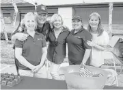  ??  ?? Terri Lemons, chief J.D. Sanders, agent Carmon White, Sabrina Gudino and agent Robin Tucker joined forces to celebrate National Night Out. The event promotes police-community partnershi­p and neighborho­od camaraderi­e.