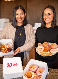  ??  ?? Above: Shenine Dube (left) and Grace Tauber of Doe Donuts with some of their baked treats.