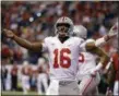  ?? MICHAEL CONROY — ASSOCIATED PRESS ?? Ohio State quarterbac­k J.T. Barrett celebrates after a 1-yard touchdown run during the first half of the Big Ten championsh­ip game against Wisconsin on Dec. 2 in Indianapol­is.