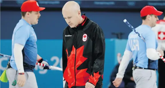  ?? NATACHA PISARENKO/THE ASSOCIATED PRESS ?? Despite high expectatio­ns, skip Kevin Koe’s Calgary rink failed to qualify for the men’s curling gold-medal game.