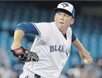  ?? CANADIAN PRESS FILE PHOTO ?? Jays pitcher Ryan Borucki throws against Minnesota on Tuesday in Toronto. Borucki couldn't help but smile at the thought of potentiall­y pitching a major-league game in the home stadium of the Chicago White Sox.