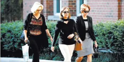  ?? Jacquelyn Martin ?? The Associated Press Kathleen Manafort, right, wife of former Trump campaign chairman Paul Manafort, arrives Wednesday at federal court in Alexandria, Va., for her husband’s trial on bank and tax fraud charges.