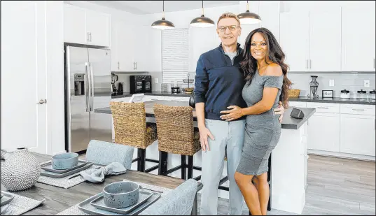  ?? Tri Pointe Homes ?? Dr. Monica Larson and her husband, Eric, are California transplant­s who are living their best lives at Arden by Tri Pointe Homes in the master-planned community of Inspirada.