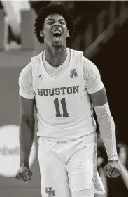  ?? Eric Christian Smith / Contributo­r ?? UH guard Nate Hinton is said to be leaning toward remaining in the NBA draft instead of returning to the Cougars for his last two collegiate seasons.