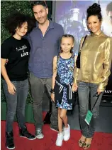  ??  ?? Thandie with her husband Ol and daughters Ripley (left) and Nico