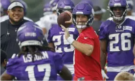  ?? Vaccine. Photograph: Bruce Kluckhohn/AP ?? Minnesota Vikings quarterbac­k Kirk Cousins says he is ‘still doing research’ when it comes to the Covid-19