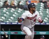  ?? CARLOS OSORIO — THE ASSOCIATED PRESS ?? Minnesota Twins designated hitter Nelson Cruz watches his grand slam during the second inning against the Detroit Tigers on Monday in Detroit.