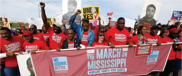  ?? (Photo by Rogelio V. Solis, AP) ?? In this March 4, 2017, file photo, thousands march to Nissan Motor Co.'s Canton, Miss., plant, following a pro-union rally. The United Auto Workers filed Monday, July 10, an election petition with the National Labor Relations Board, to force a...