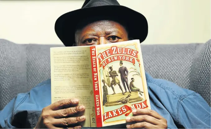  ?? Picture: Masi Losi ?? Zakes Mda with his latest work. He loves dealing with modern issues through the lens of historical novels.