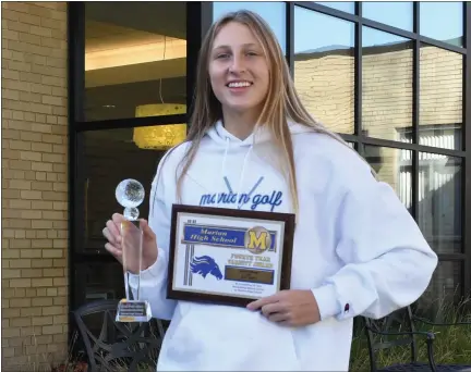  ?? COURTESY PHOTO ?? Marian senior Shannon Kennedy poses with the 2020 Miss Golf trophy after being awarded with the honor last week at Marian High School.