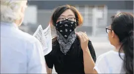  ??  ?? THE ACTIVIST GROUP Boyle Heights Against Artwashing and Displaceme­nt holds a demonstrat­ion outside UTA Artist Space in Boyle Heights.