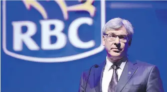  ?? FRANK GUNN, THE CANADIAN PRESS ?? Royal Bank president Dave McKay is expecting a first-quarter writedown due to U.S. President Donald Trump's tax changes, but also significan­t tax savings on future earnings.