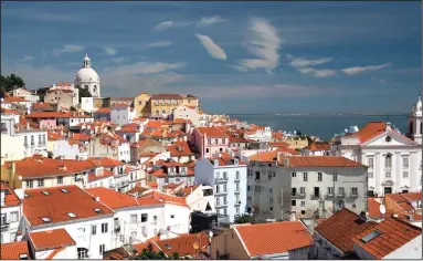  ?? (Rick Steves) ?? Breathtaki­ng views are bountiful in this city of red-tiled roofs on the yawning mouth of the Tejo River.