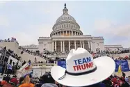  ?? YURI GRIPAS/ABACA PRESS ?? Supporters of former President Donald Trump protest on the steps of the U.S. Capitol building in Washington, D.C., on Jan 6.