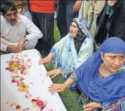  ?? AFP FILE ?? Relatives of deputy SP Mohammad Ayub Pandith in mourning in Srinagar after his death last month.