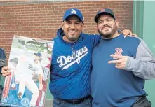  ?? ANGELA ROWLINGS / BOSTON HERALD ?? LOVE OF THE GAME: Gary Ochoa, left, and Herschel Gonzalez are excited for the Series.