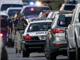  ?? JAY JANNER / AMERICAN-STATESMAN ?? Officials say the Goodwill explosion Tuesday night was totally unrelated to the serial bomber, identified by law enforcemen­t as 23-year-old Mark Conditt, who apparently killed himself as police closed in on him early Wednesday.