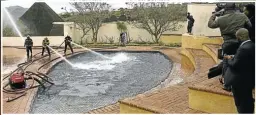  ?? Picture: Rogan Ward ?? The so-called fire pool at the private home of former president Jacob Zuma, pictured left, who spent much effort in trying to avoid repaying public money spent on renovation­s, only to be thwarted by the courts.