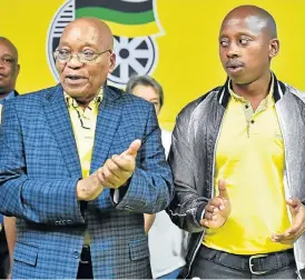  ?? /The Herald ?? Supporter: President Jacob Zuma congratula­tes Andile Lungisa, right, on his election as ANC Nelson Mandela Bay chairman.