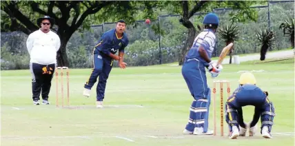  ?? MACLENNAN Pictures: SUE ?? PATIENT GAME: A Peterhouse batsman prepares to take on a delivery from Graeme College’s Ajay Jeggels in their fixture at Graeme College’s Somerset Field on Saturday during the Makhanda Schools Cricket Festival.