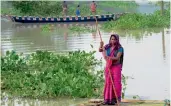  ?? — PTI ?? Flood-affected villagers commute to safer places using boats in Assam’s Morigaon district.