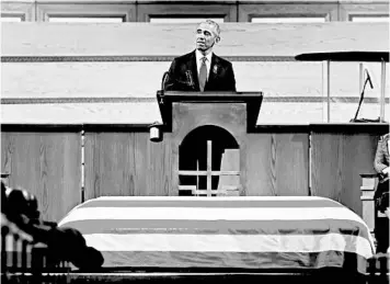  ?? ALYSSA POINTER/GETTY-AFP ?? Former President Barack Obama eulogizes John Lewis at the icon’s funeral Thursday at the state Capitol in Atlanta.