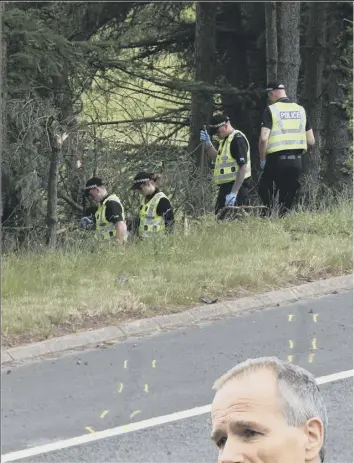  ?? Main picture: PA ?? As police searched the scene yesterday, Sir Stephen, right, issued an apology to the families of John Yuill, who died, and Lamara Bell, who remains in a coma