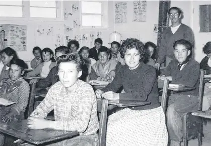  ?? PHOTO COURTESY OF SOCIETE HISTORIQUE DE SAINT-BONIFACE ?? A classroom in Marieval Indian Residentia­l School in Saskatchew­an, which is now believed to be the site of 751 unmarked graves.