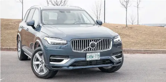  ?? CLAYTON SEAMS • POSTMEDIA ?? Choosing a plug-in hybrid, like the 2021 Volvo XC90 Recharge Inscriptio­n Expression, lets you test electrific­ation without fully committing to the plug.