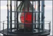  ?? SCOTT ROBINSON / THE NEW YORK TIMES ?? The Cape Meares Lighthouse has cherry-colored panels on its Fresnel lens.