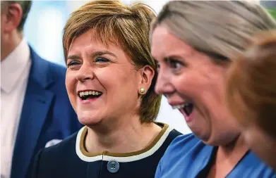  ??  ?? All smiles: Miss Sturgeon opening a trauma centre at Ninewells Hospital, Dundee, yesterday