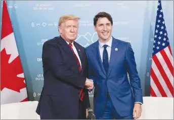  ?? CP PHOTO ?? Prime Minister Justin Trudeau meets with President Donald Trump at the G7 leaders summit in La Malbaie, Que.