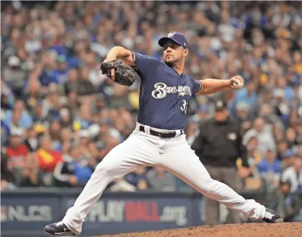  ?? MARK HOFFMAN / MILWAUKEE JOURNAL SENTINEL ?? Milwaukee Brewers reliever Xavier Cedeño struggled after coming on in the eighth.