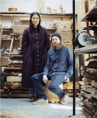  ?? By Jessica Doyle. Photograph­s by Nicholas JR White ?? From above right Each Takahashi Mcgil spoon is different; the couple in their studio in Devon; Takahashi chiselling the outside of the spoon bowl.