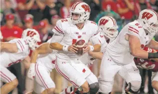  ?? | AP ?? Wisconsin quarterbac­k Alex Hornibrook has been shaky this season with 13 intercepti­ons.